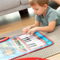 Tapis musical 2-en-1 Beats'n'Tunes d'Innovagoods : clavier avec 4 instruments, batterie avec tambours et cymbales, antidérapant,