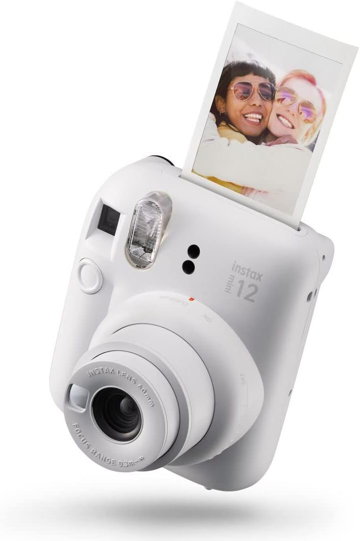 Fujifilm Pack Best Memories Instax Mini 12 Appareil Photo Instantané Blanc Argile + Film Instax Mini 10 unités. + 3 Cadres Photo - Taille de l'image 62x46 mm - Flash Auto - Exposition Automatique - Mini Miroir pour Selfies - Mode Gros Plan