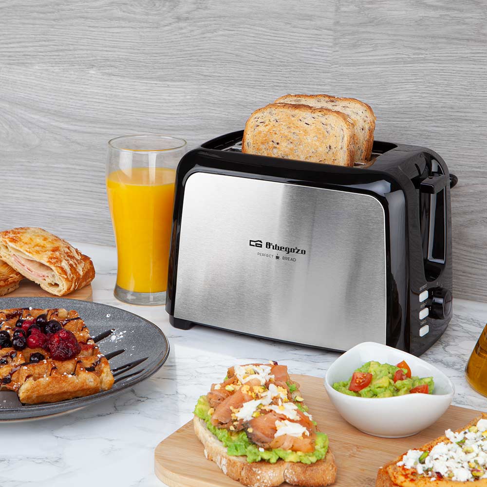 Grille-pain Orbegozo TO 3060 en acier inoxydable - Puissant et polyvalent - Avec 7 niveaux de grillage - Fonction décongélation et réchauffage - et système de centrage automatique du pain